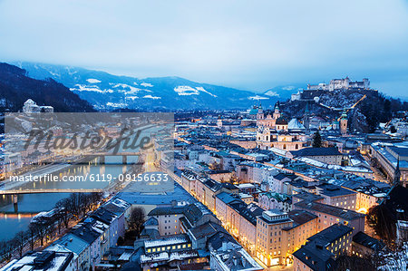 View over the old town, UNESCO World Heritage Site, and Hohensalzburg Castle at dusk, Salzburg, Austria, Europe