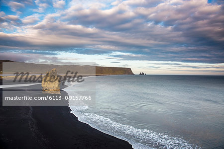 Black sand beach and tranquil, remote ocean, Dyrholaey, Iceland