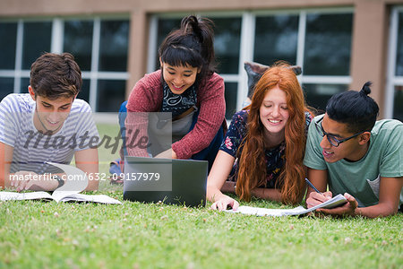 College students studying together outdoors
