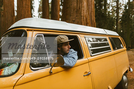 Man driving camper van, Sequoia National Park, California, USA