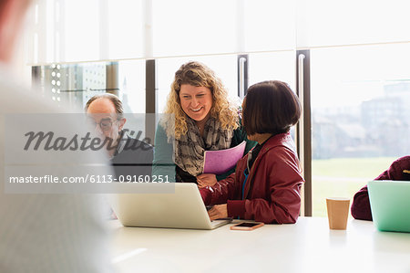 Business people talking in conference room meeting