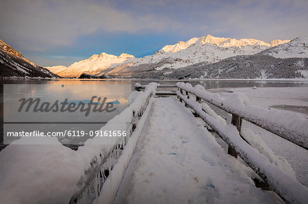 Walkway covered with snow, Lake Sils, Plaun da Lej, Maloja Region, Canton of Graubunden, Engadine, Switzerland, Europe