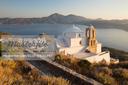 View of Plaka with Greek Orthodox church and Milos Bay from Plaka Castle, Milos, Cyclades, Aegean Sea, Greek Islands, Greece, Europe