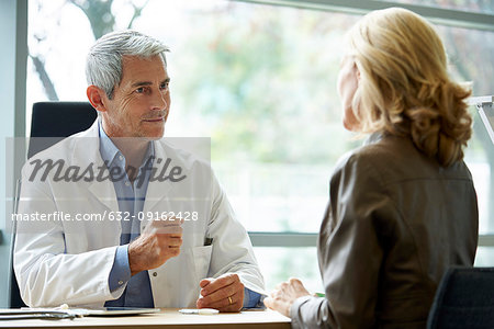Doctor encouraging his patient
