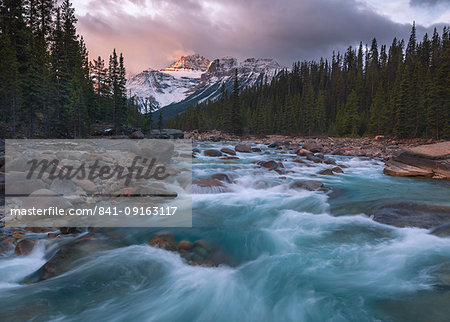 Sunrise and glacial blue rushing waters at Mistaya Canyon, Banff National Park, UNESCO World Heritage Site, Alberta, The Rockies, Canada, North America