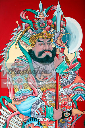 Guardian figure paintings on gate, Hoi Tuong Te Nguoi Hoa Buddhist Chinese temple, Phu Quoc, Vietnam, Indochina, Southeast Asia, Asia