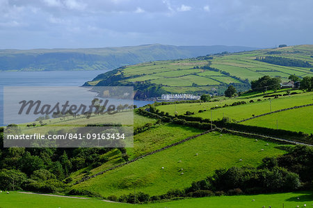 Pastures and fields and the little village of Cushendun, Antrim County, Ulster, Northern Ireland, United Kingdom, Europe