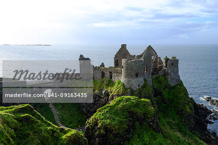 Dunluce Castle, located on the edge of a basalt outcropping in County Antrim, Ulster, Northern Ireland, United Kingdom, Europe