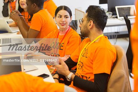 Hackers coding for charity at hackathon