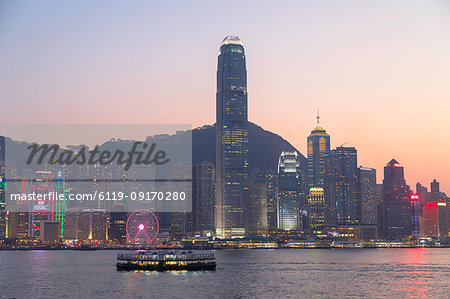 Star Ferry in Victoria Harbour at dusk, Hong Kong Island, Hong Kong, China, Asia