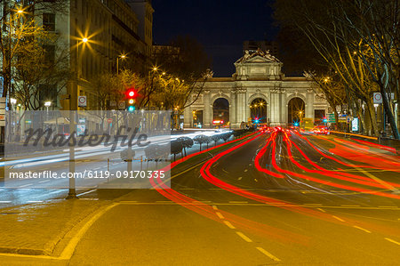 View of Triomphal Arch (Puerta de Alcala) in Plaza de la Independencia at dusk, Madrid, Spain, Europe