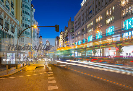 View of architecture and trail lights on Gran Via at dusk, Madrid, Spain, Europe