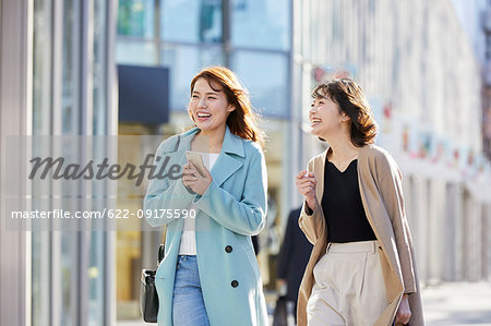 Japanese women window shopping downtown Tokyo