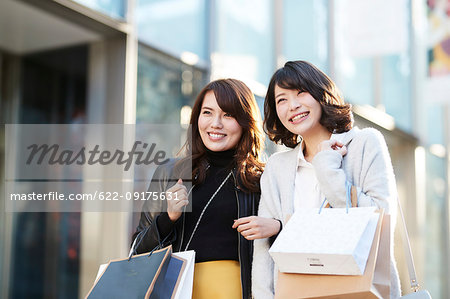 Japanese women window shopping downtown Tokyo