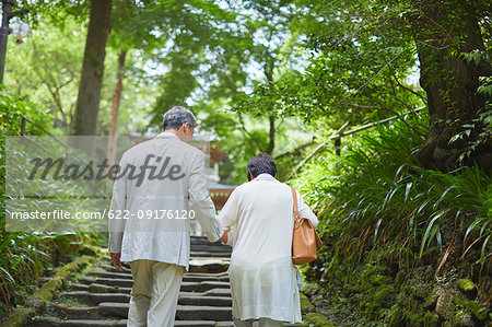 Japanese senior couple having fun at traditional inn