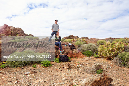 Mature tourist couple in rugged landscape, portrait, Las Palmas, Gran Canaria, Canary Islands, Spain
