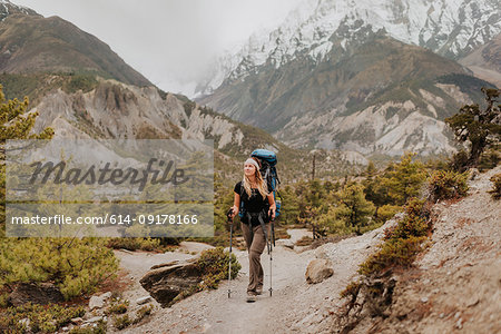 Hiker on trail, Annapurna Circuit, the Himalayas, Manang, Nepal