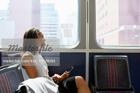 Businesswoman on train