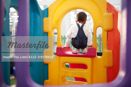 Boy playing on slide
