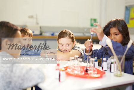 Curious kids conducting science experiment