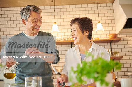 Japanese senior couple in the kitchen