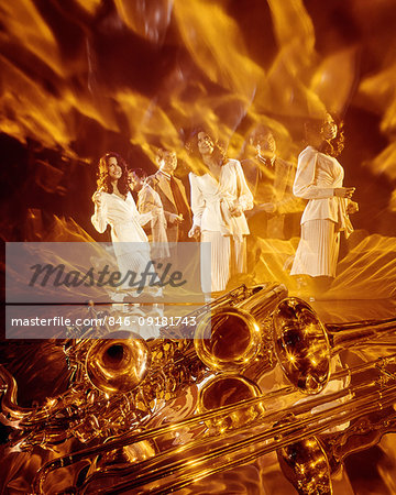 1960s 1970s TRIPTYCH MULTIPLE EXPOSURE YOUNG COUPLE ENTERTAINERS PERFORMING WOMAN IN WHITE HORNS & FLAMES HOT MUSIC FOREGROUND