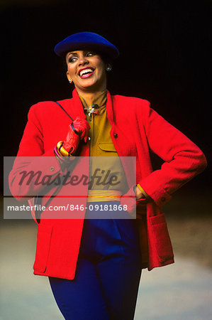 1980s 1970s AFRICAN AMERICAN WOMAN SMILING WEARING HIGH FASHION CLOTHING