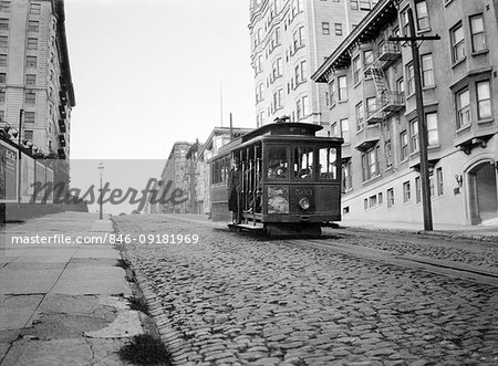 1910s SAN FRANCISCO CABLE CAR GOING UP HILL ON BRICK ROAD CALIFORNIA USA