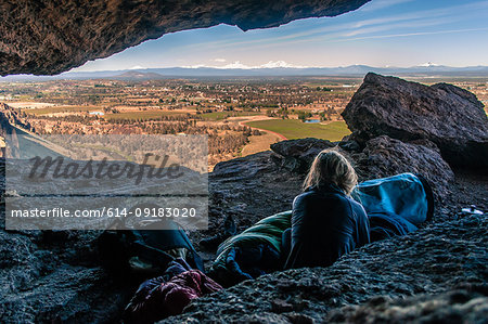 Rock climber on summit, Smith Rock State Park, Oregon, USA