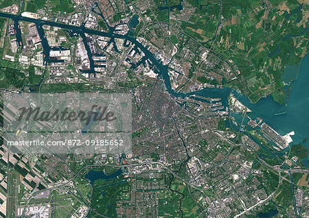 Color satellite image of Amsterdam, capital city of Netherlands. The River Amstel flows through the city. Image collected on May 26, 2017 by Sentinel-2 satellites.