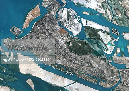 Color satellite image of Abu Dhabi, capital city of United Arab Emirates. The city is on an island connected by bridges to the mainland and other islands. Image collected on September 21, 2017 by Sentinel-2 satellites.