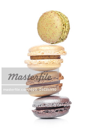 French luxury colorful macarons dessert cakes on white background with sugar on top