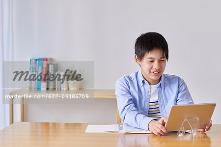 Japanese kid studying at home