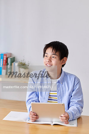 Japanese kid studying at home