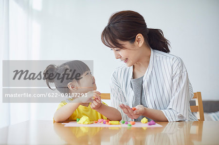 Japanese mother and kid playing