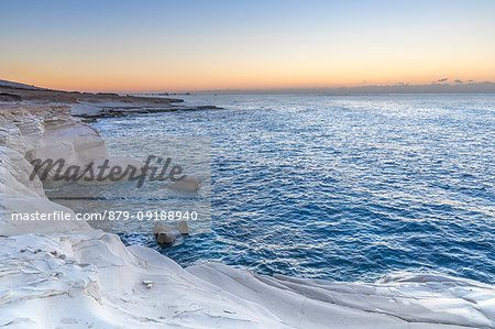 Cyprus, Limassol, The crystal water and the white rocks of Governor's Beach at dawn