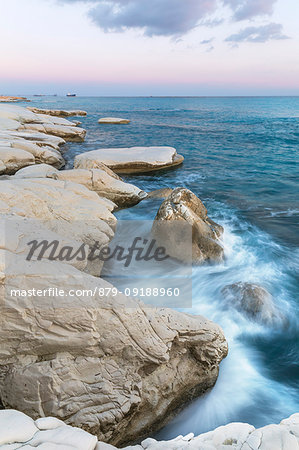 Cyprus, Limassol, The crystal water and the white rocks of Governor's Beach at sunrise