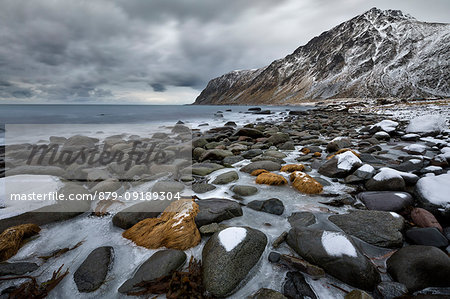 sea scape in Vareid whit Hustinden mountain, municipality of Flakstad, Lofoten Island, Norway, Europe