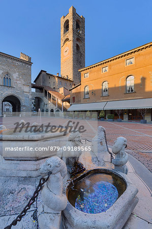 Piazza Vecchia with civic tower and Fontana del Contarini. Bergamo(Upper Town), Lombardy, Italy. Piazza Vecchia with civic tower and Fontana del Contarini. Bergamo(Upper Town), Lombardy, Italy.