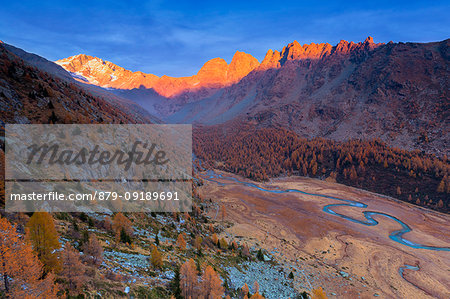 Elevated view of the Piana di Predarossa during sunset. Predarossa Valley, Valmasino, Valtellina, Lombardy, Italy, Europe.