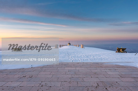 Monte Grappa, province of Vicenza, Veneto, Italy, Europe. Sunrise at the summit of Monte Grappa, where there is a military monument.