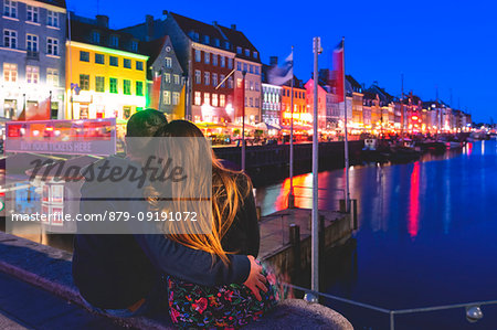 Tourist in Nyhavn, Copenhagen, Hovedstaden, Denmark, Northern Europe.