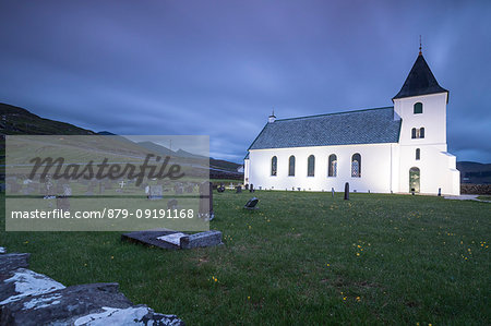 Church of Eidi and cemetery at dusk, Eysturoy Island, Faroe Islands