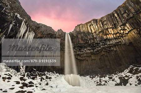 Svartifoss waterfall at sunset, Skaftafell National Park, Southern Iceland