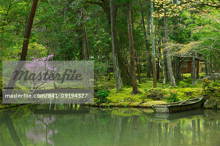 Pond with rowboat in the moss garden of Saiho-ji temple, UNESCO World Heritage Site, Kyoto, Japan, Asia