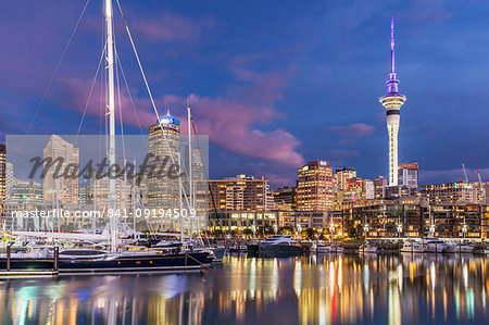 Viaduct Harbour waterfront area and Auckland Marina at night, Auckland skyline, Sky Tower, Auckland, North Island, New Zealand, Pacific