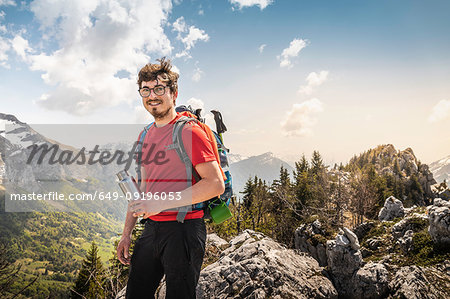 Hiker trekking French Alps, Parc naturel régional du Massif des Bauges, Chatelard-en-Bauges, Rhone-Alpes, France