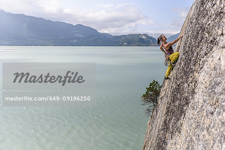 Woman rock climbing, Squamish, Canada