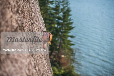 Woman rock climbing, Malamute, Squamish, Canada