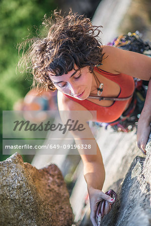 Woman rock climbing, Malamute, Squamish, Canada